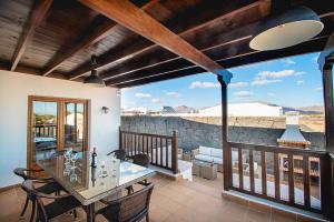 big-playa-blanca-villa-vista-rey-terrace-table