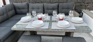 playa-blanca-villa-villa-arabella-outside-lounging-area-with-set-table